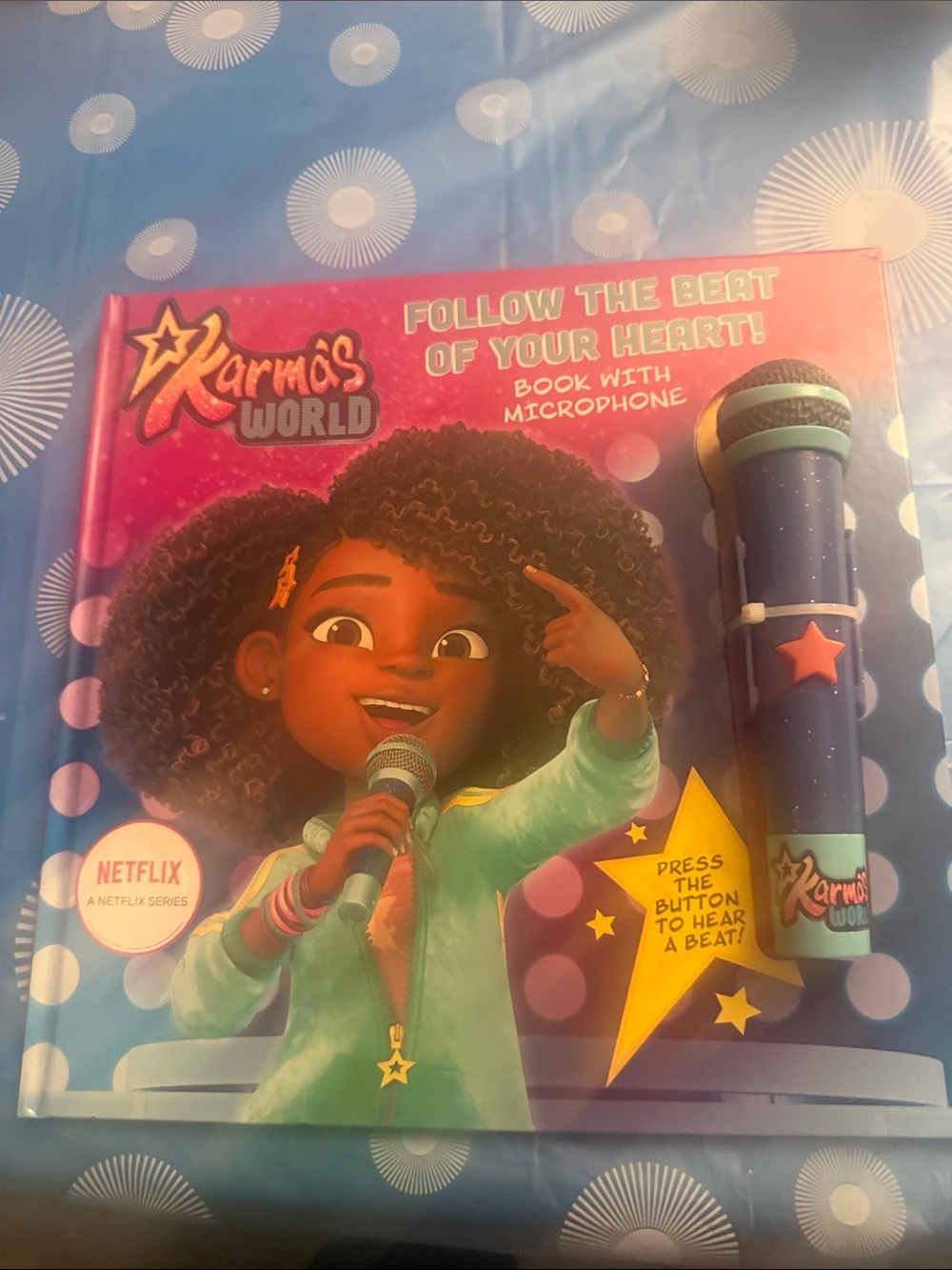 Follow the Beat of Your Heart Book with Purple Microphone